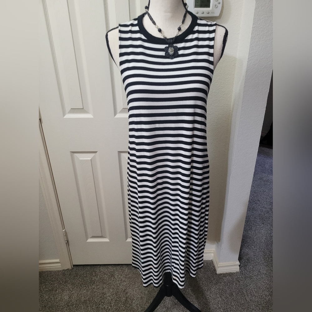 4/$25. DRESS USED GENTLY large